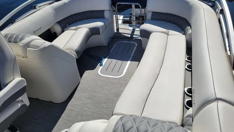 Slide: The Image of 2020 Bennington 24 RTFBC boat interior with plush seating and modern design. - 7