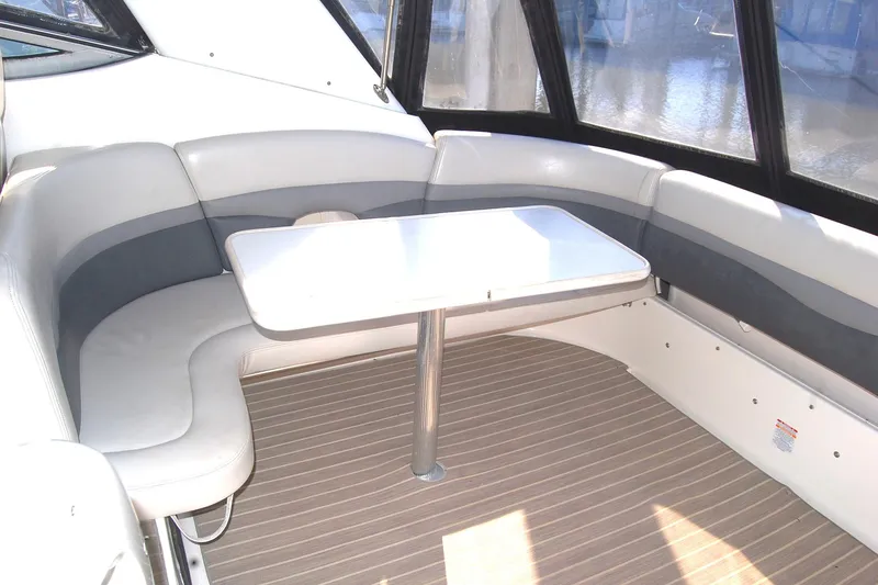 Slide: The Image of Interior of 2006 Chaparral Signature 350 boat with seating and table. - 36