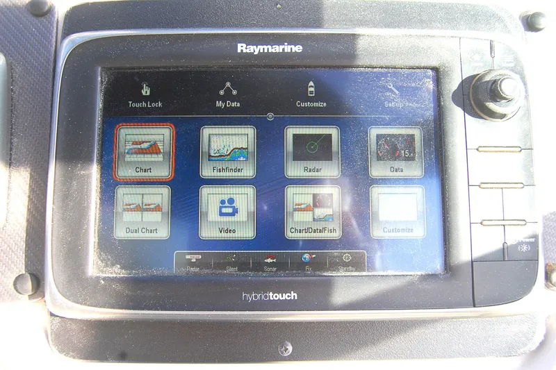 Slide: The Image of Raymarine touchscreen display on 2006 Chaparral Signature 350 boat, showing navigation and data options. - 42