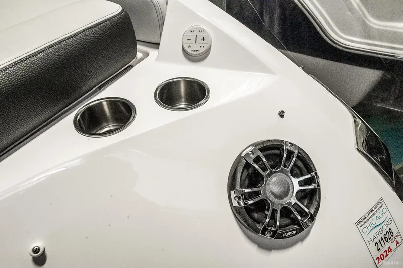 Slide: The Image of 2021 Regal 2800 Bowrider interior with cup holders and speaker system. - 18