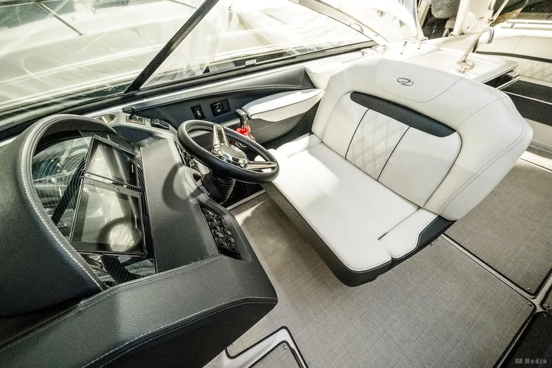 Slide: The Image of 2021 Regal 2800 Bowrider interior with sleek dashboard and comfortable seating. - 23