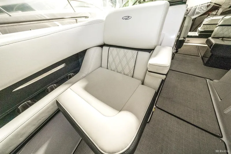 Slide: The Image of Luxurious seating in 2021 Regal 2800 Bowrider boat interior. - 44