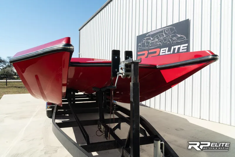 Slide: The Image of 1998 Warlock 28 SXT boat on trailer at RP Elite Motors & Marine. - 28