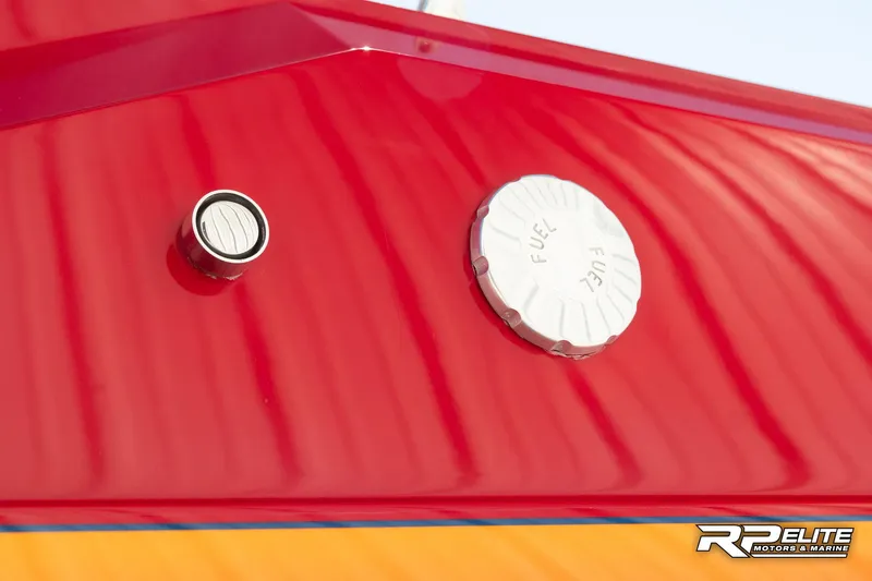Slide: The Image of Red Warlock 28 SXT 1998 boat fuel cap and vent detail. - 34