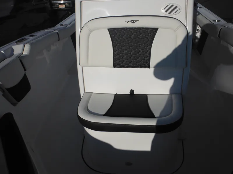 Slide: The Image of 2025 Tidewater 232 LXF boat seat with black and white upholstery. - 18