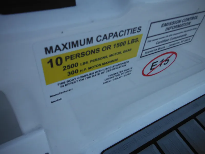 Slide: The Image of 2025 Tidewater 232 LXF boat capacity label, 10 persons or 1500 lbs, 300 HP max. - 28