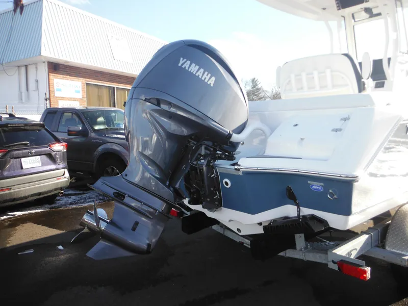 Slide: The Image of 2025 Tidewater 232 LXF boat with Yamaha outboard motor on trailer. - 3