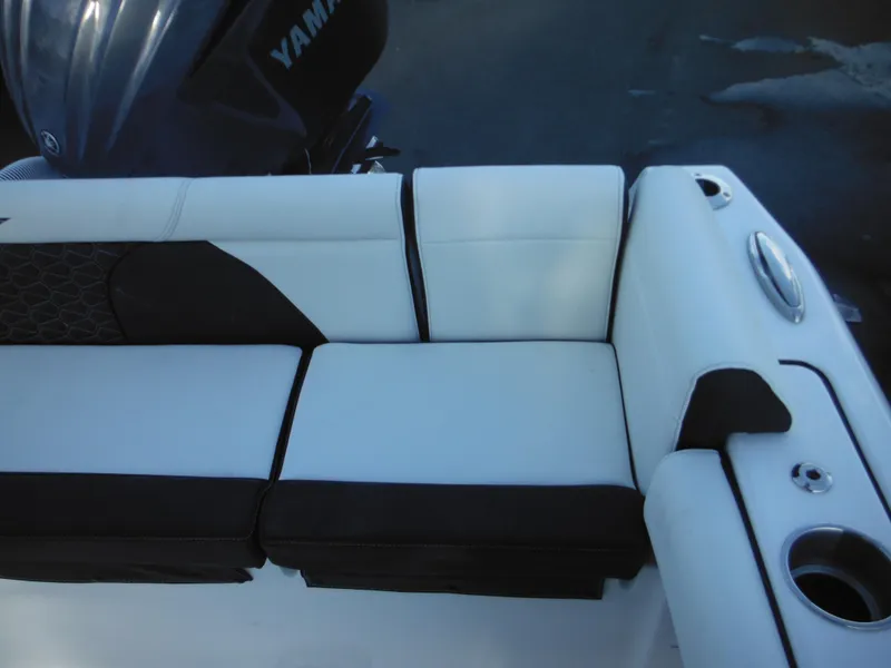 Slide: The Image of 2025 Tidewater 232 LXF boat seating with Yamaha engine in background. - 30