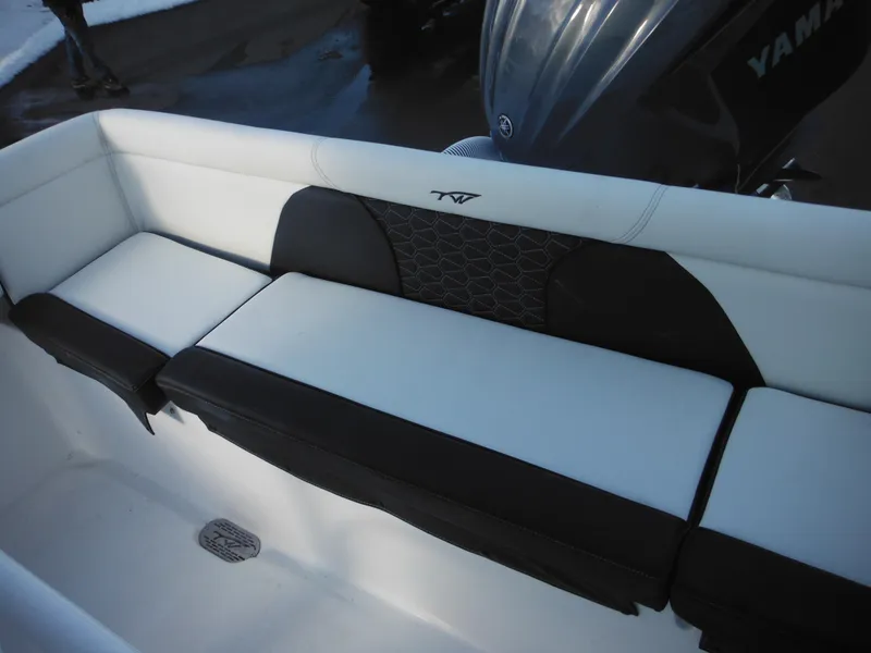 Slide: The Image of 2025 Tidewater 232 LXF boat seating with Yamaha engine in background. - 31