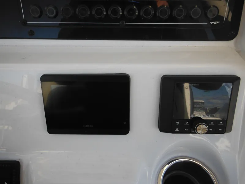 Slide: The Image of Control panel of 2025 Tidewater 232 LXF boat with electronic displays. - 47