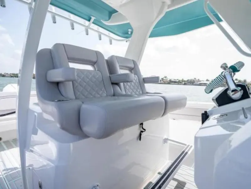 Slide: The Image of 2023 Intrepid 375 boat interior with plush seating and modern design. - 17