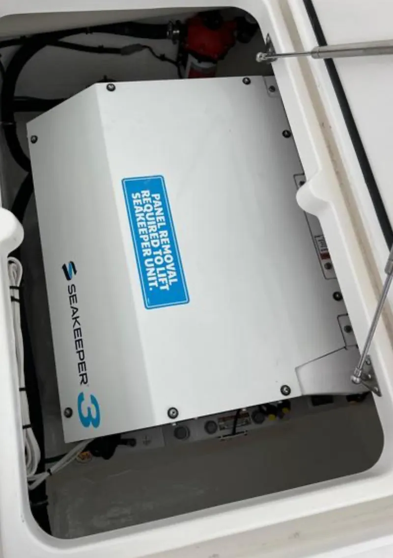 Slide: The Image of Seakeeper 3 stabilizer unit in 2023 Intrepid 375 boat compartment. - 5
