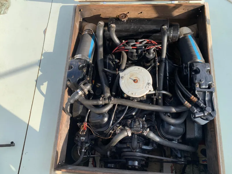 Slide: The Image of 1987 Nauset 249 engine, detailed view of components and wiring. - 4