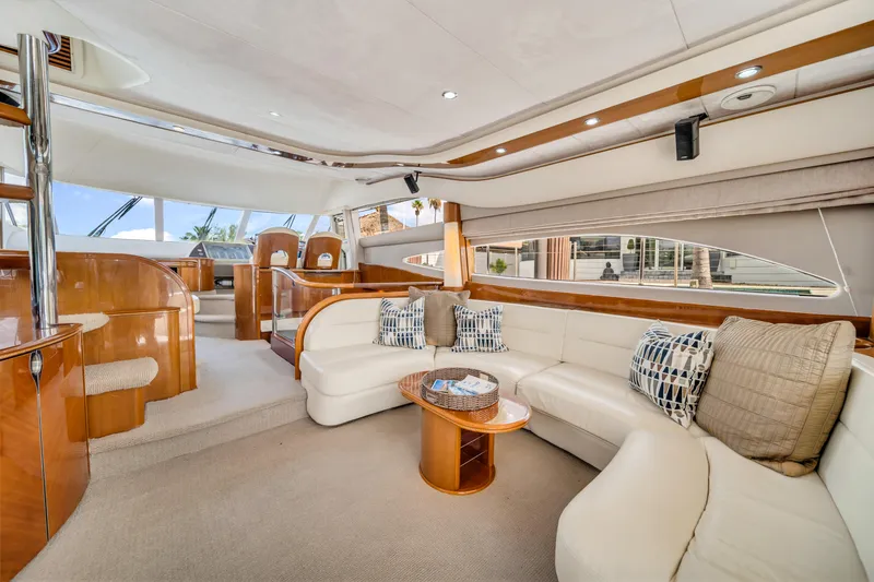 Slide: The Image of Luxurious interior of 2002 Princess 61 yacht with elegant seating and modern design. - 20
