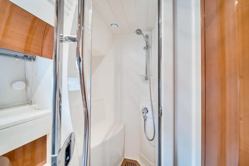 Slide: The Image of Luxurious bathroom in 2002 Princess 61 yacht with modern shower design. - 33