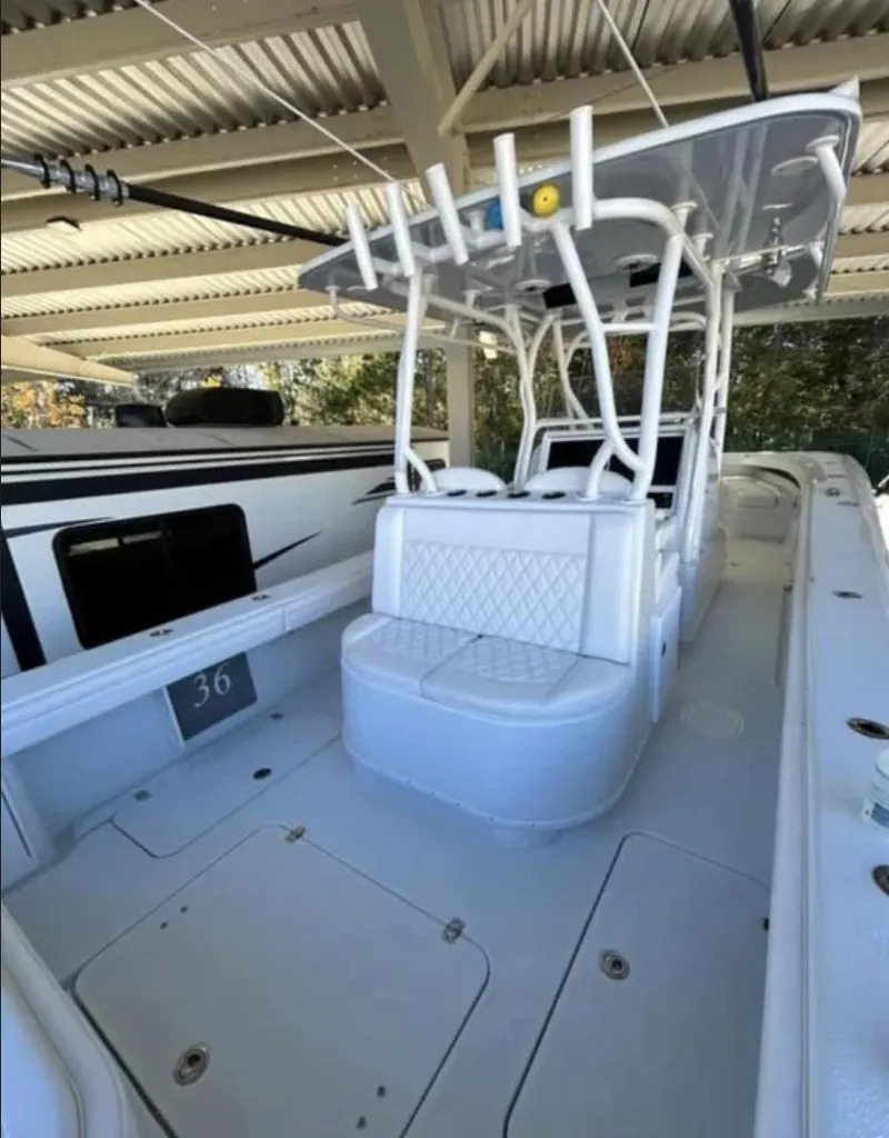Slide: The Image of 2024 Yellowfin 36 Offshore boat with spacious deck and modern design. - 8