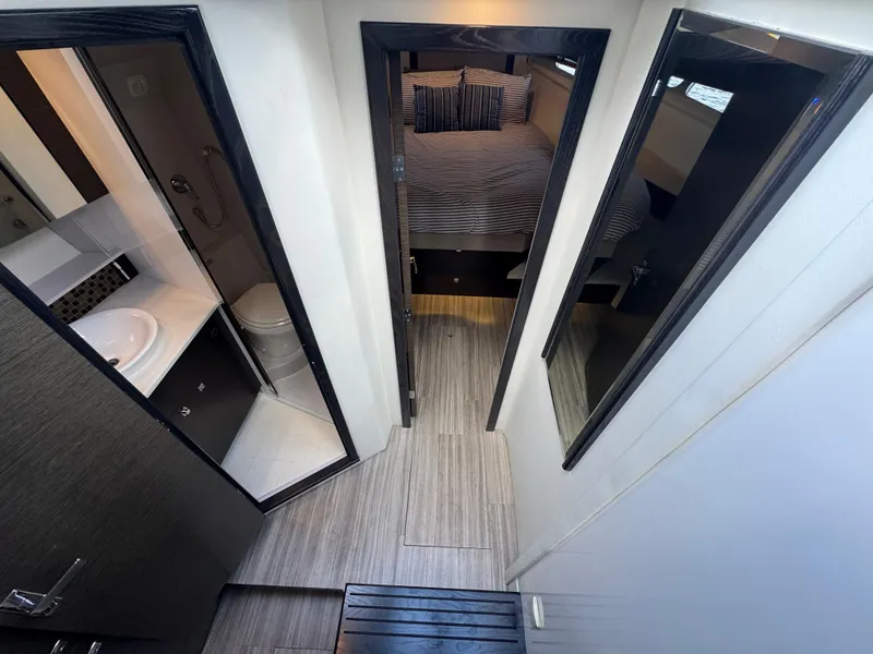 Slide: The Image of 2017 Cruisers Yachts 45 Cantius interior with bedroom and bathroom view. - 15