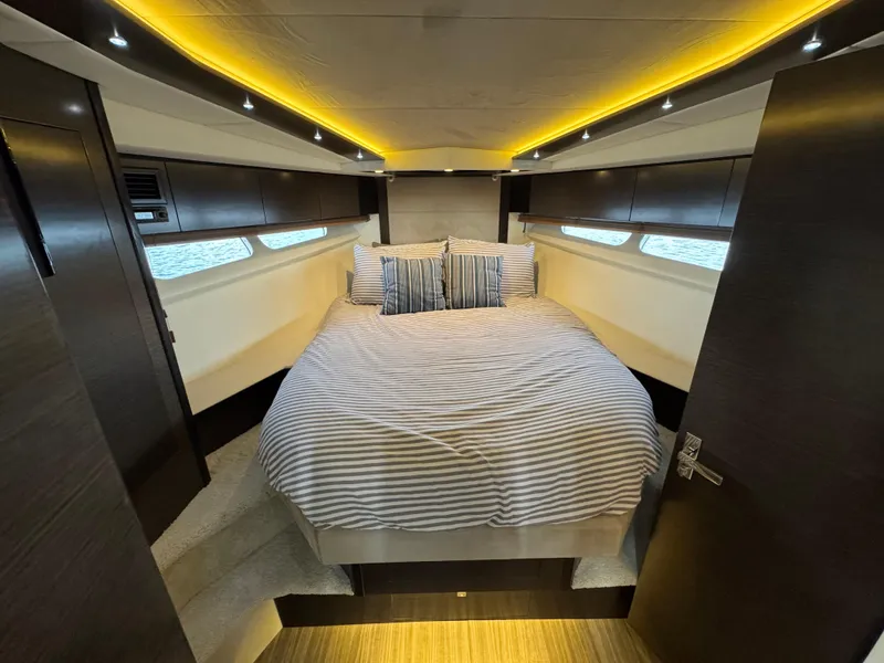 Slide: The Image of Luxurious bedroom interior of 2017 Cruisers Yachts 45 Cantius with ambient lighting. - 16