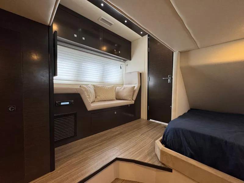 Slide: The Image of Interior of 2017 Cruisers Yachts 45 Cantius, featuring modern design and cozy seating area. - 24