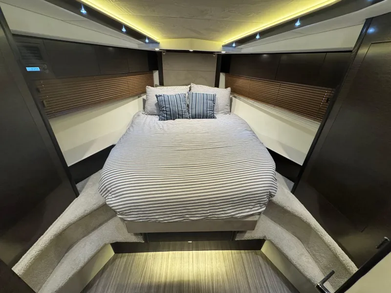 Slide: The Image of Luxurious 2017 Cruisers Yachts 45 Cantius cabin interior with cozy bed and modern design. - 25