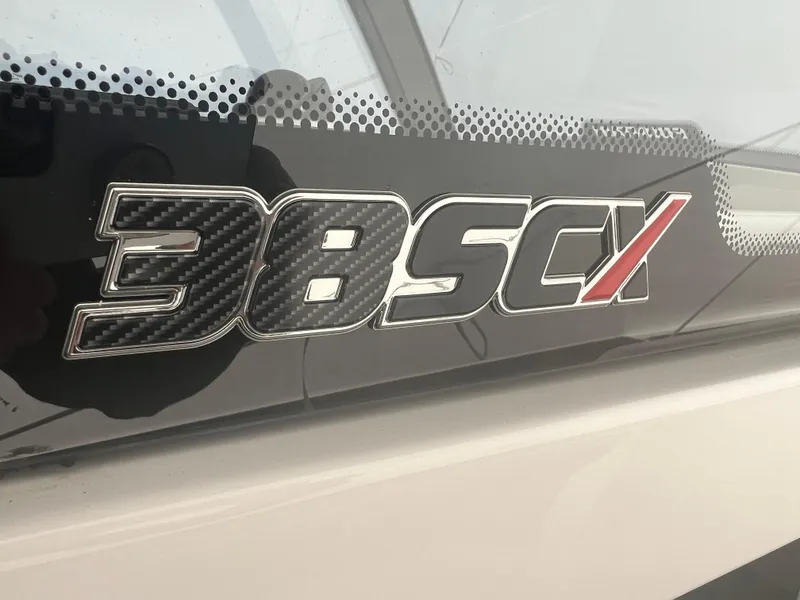 Slide: The Image of Fountain 38 SCX 2025 model logo on boat exterior. - 39