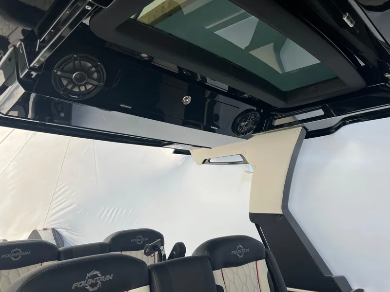 Slide: The Image of 2025 Fountain 38 SCX interior with modern seating and audio system. - 40