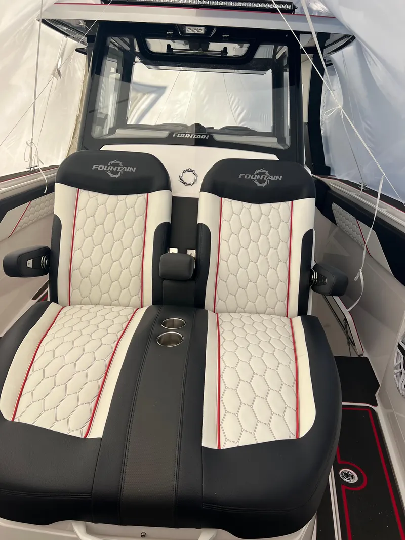Slide: The Image of 2025 Fountain 38 SCX boat interior with stylish seating and modern design. - 41