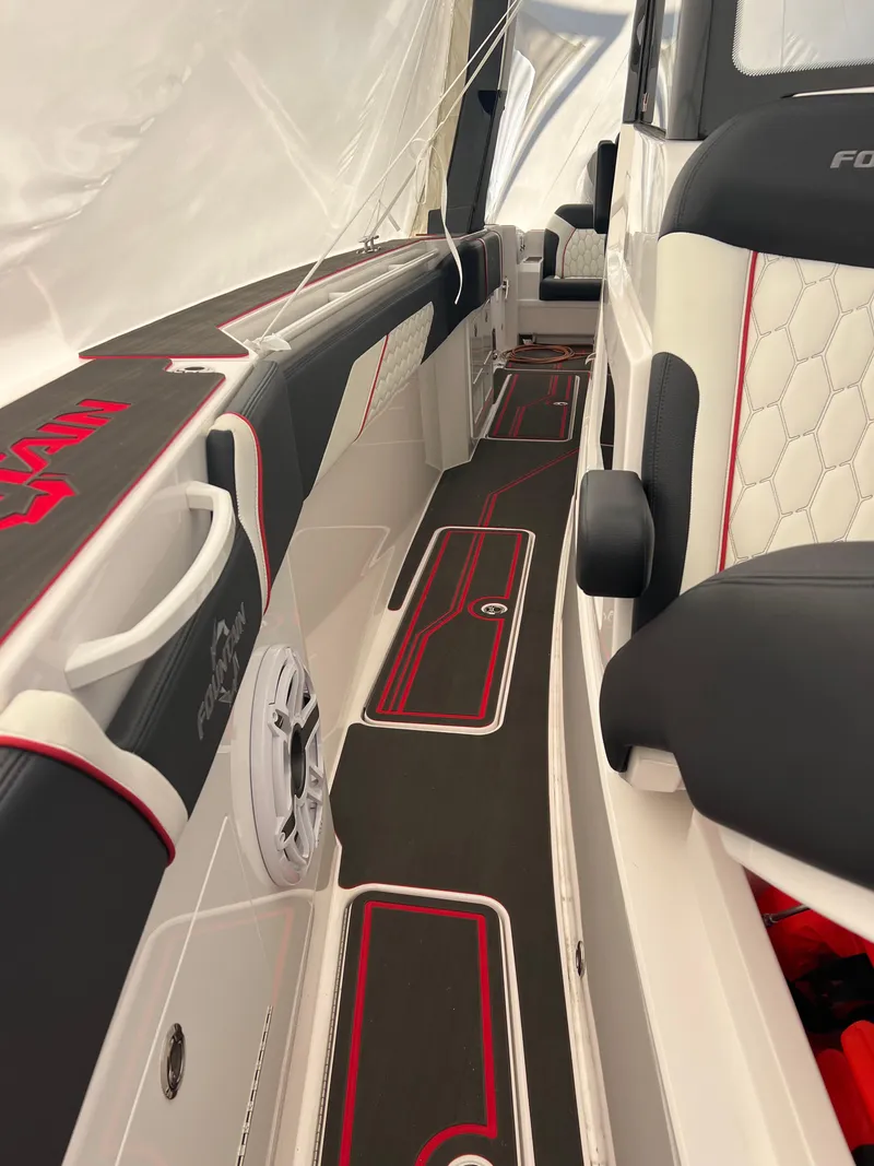 Slide: The Image of 2025 Fountain 38 SCX boat interior with sleek seating and modern design. - 45