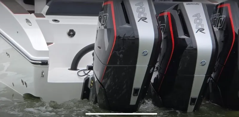 Slide: The Image of 2025 Fountain 38SCX boat with powerful Mercury 400R outboard engines in water. - 6
