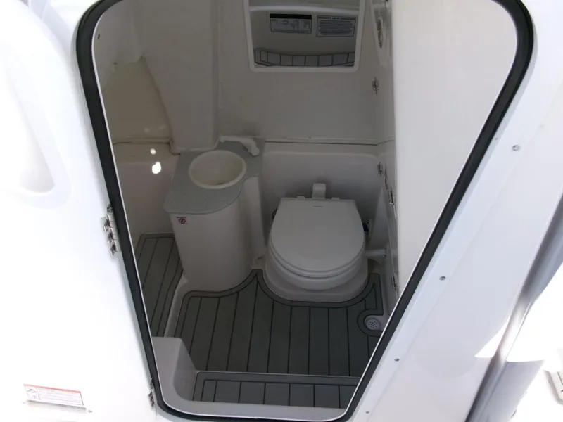 Slide: The Image of 2025 Sea Fox 268 Commander boat interior bathroom with toilet and storage. - 18
