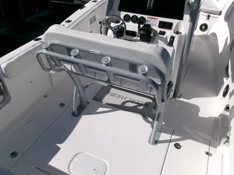 Slide: The Image of 2025 Sea Fox 268 Commander boat interior with helm and seating area. - 27