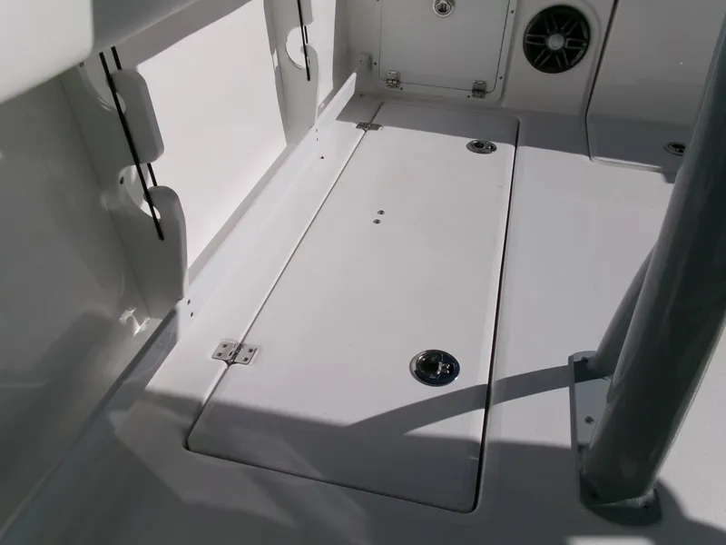 Slide: The Image of 2025 Sea Fox 268 Commander boat deck with storage compartment and speaker. - 30