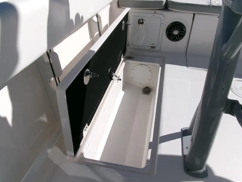 Slide: The Image of 2025 Sea Fox 268 Commander boat storage compartment and seating area. - 31