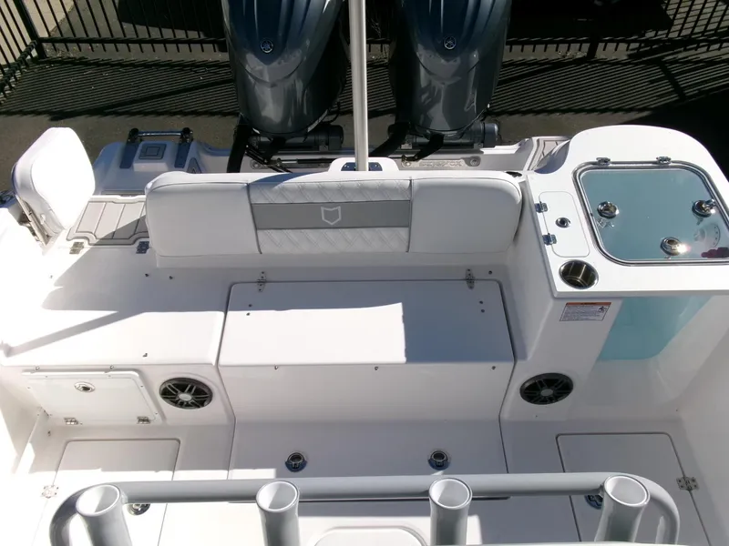 Slide: The Image of 2025 Sea Fox 268 Commander boat interior with seating and dual engines. - 35