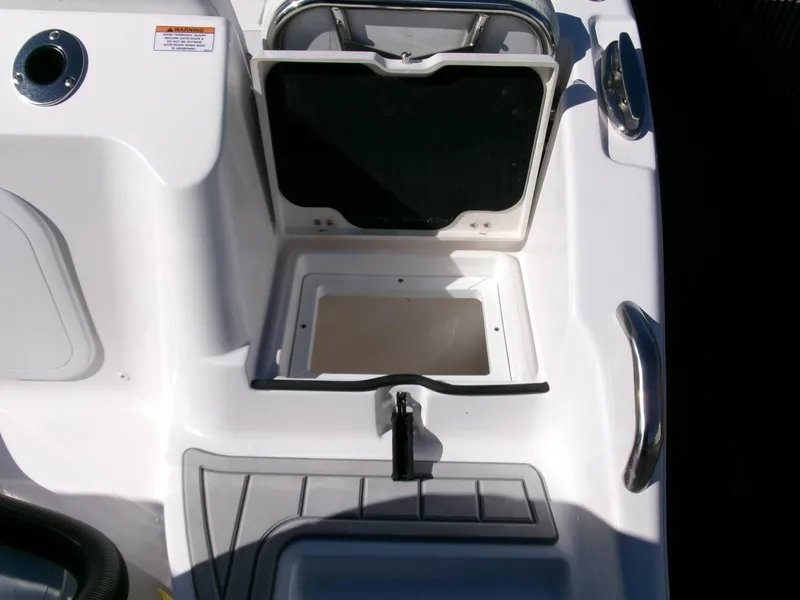 Slide: The Image of 2025 Sea Fox 268 Commander boat storage compartment with open hatch. - 47