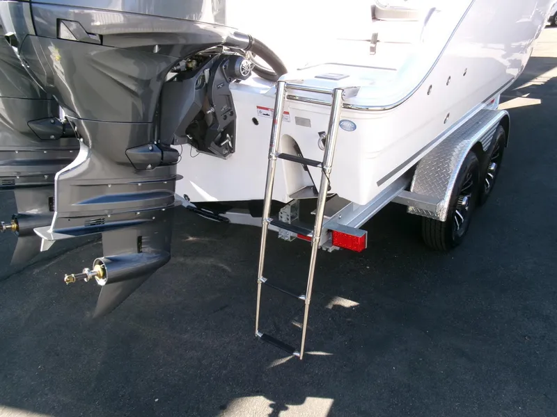 Slide: The Image of 2025 Sea Fox 268 Commander boat with dual engines and ladder on trailer. - 48