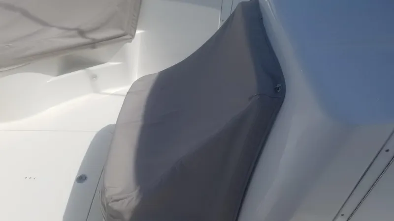 Slide: The Image of 2018 Edgewater 320 CC boat seat with protective cover. - 17