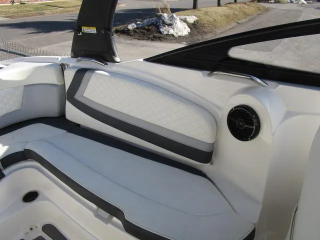 Slide: The Image of Interior of a 2017 Larson 292 LXI boat with white and gray seating. - 30