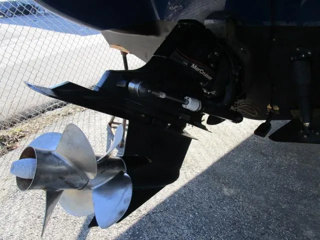 Slide: The Image of 2017 Larson 292 LXI boat propeller and drive system close-up. - 37