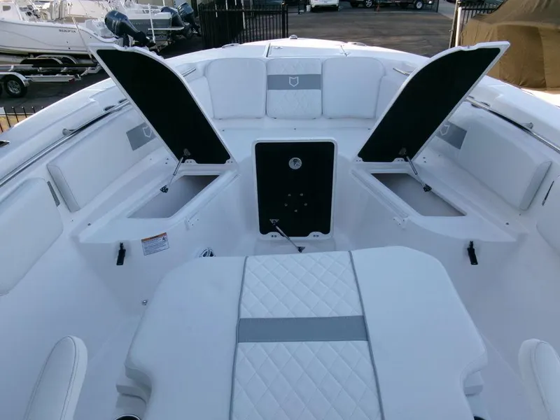Slide: The Image of 2025 Sea Fox 288 Commander boat interior with open storage compartments. - 14