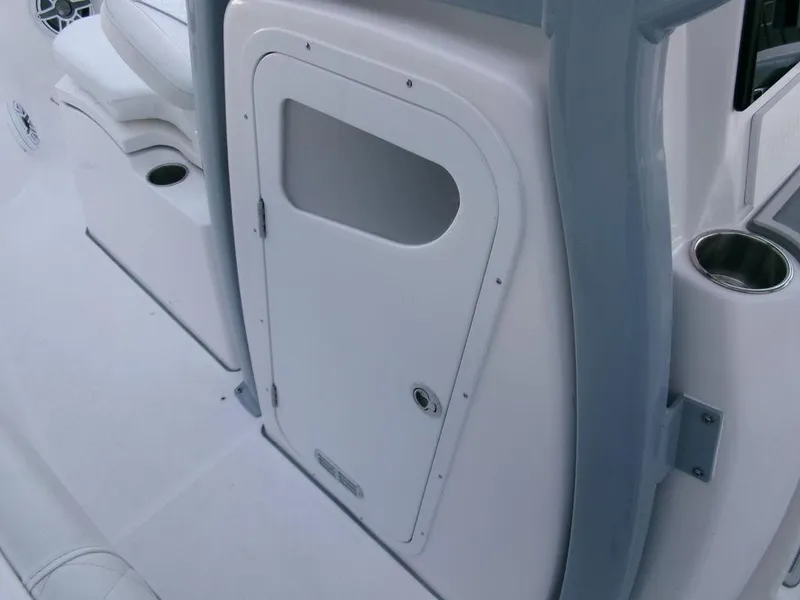 Slide: The Image of 2025 Sea Fox 288 Commander boat interior with storage compartment and seating. - 20