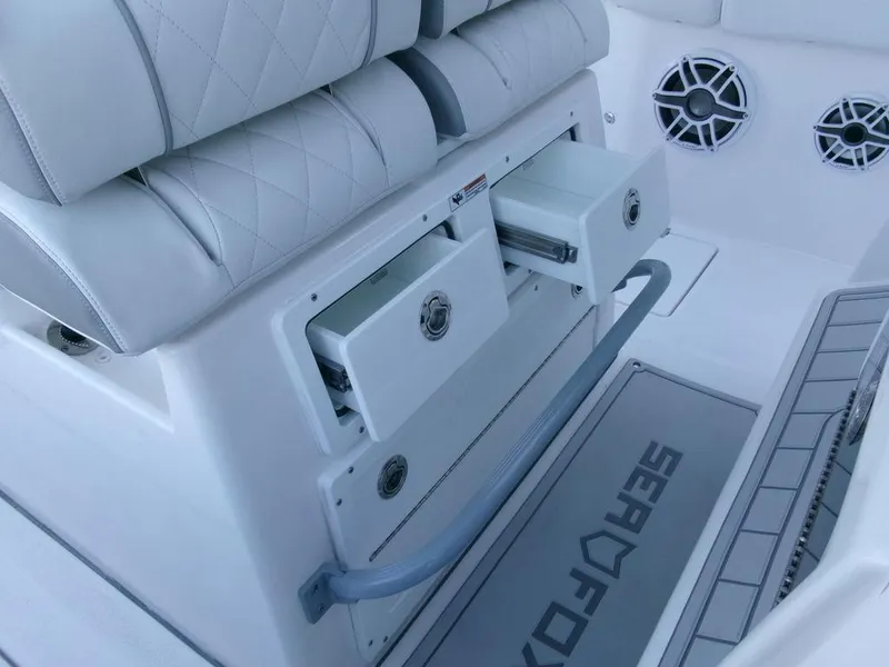 Slide: The Image of 2025 Sea Fox 288 Commander boat interior with storage drawers and speakers. - 31