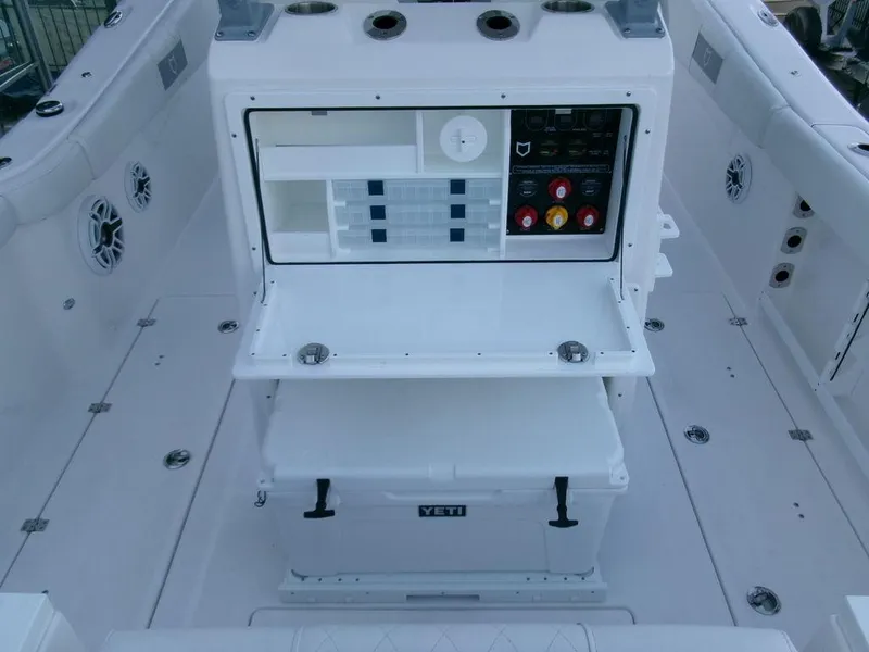 Slide: The Image of 2025 Sea Fox 288 Commander boat deck with storage and control panel. - 33