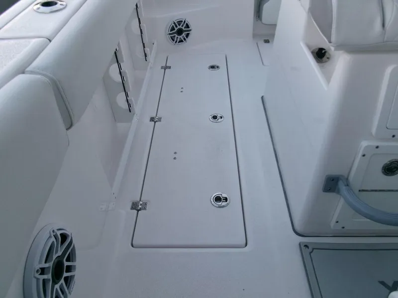 Slide: The Image of 2025 Sea Fox 288 Commander boat interior with storage compartments and speakers. - 34