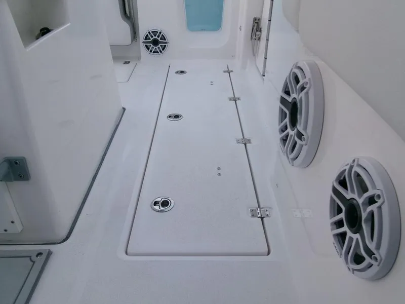 Slide: The Image of 2025 Sea Fox 288 Commander boat interior with speakers and storage compartments. - 36