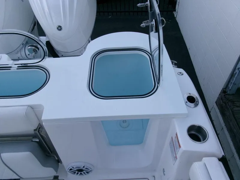 Slide: The Image of 2025 Sea Fox 288 Commander boat interior with storage compartments and seating area. - 41