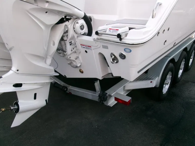 Slide: The Image of 2025 Sea Fox 288 Commander boat on a triple-axle trailer, rear view. - 45