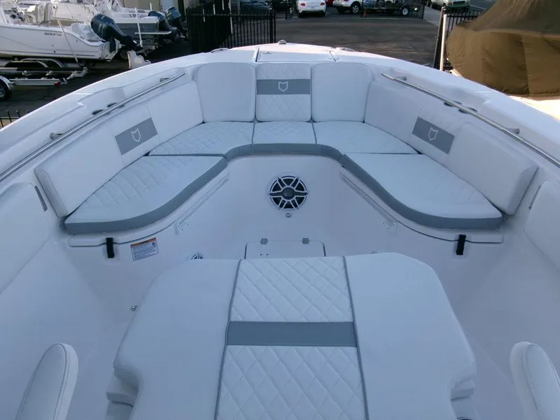 Slide: The Image of 2025 Sea Fox 288 Commander boat interior with cushioned seating and modern design. - 7