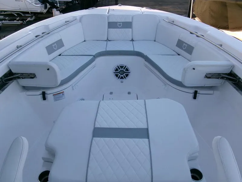 Slide: The Image of 2025 Sea Fox 288 Commander boat interior with white cushioned seating. - 8