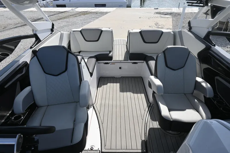 Slide: The Image of 2023 Yamaha Boats 252SD interior with modern seating and sleek design. - 11